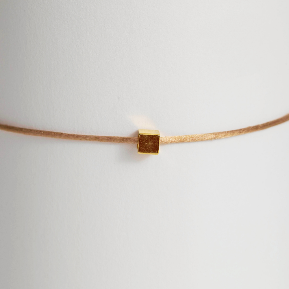 Bracelet breloque Cube doré